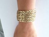 PULSEIRA TRANÇADA DOURADA